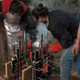 Image for article titled Casting Molten Metal On Wood With a Hungarian Design Master